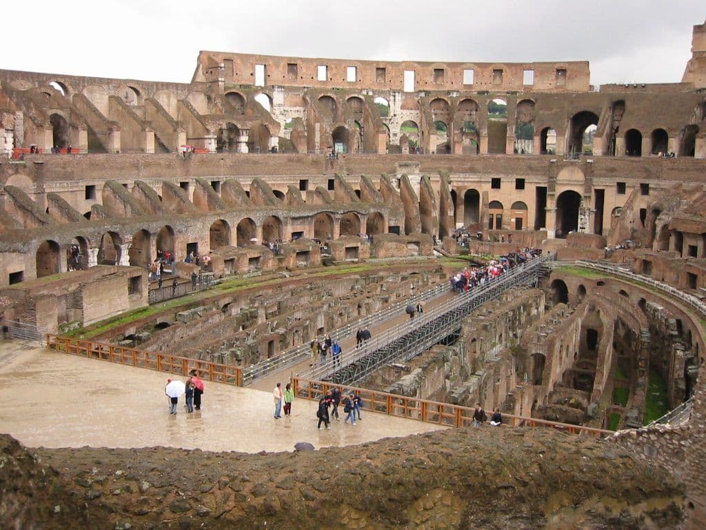 Inside the Colosseum, looking across the arena and the stepped seating tiers