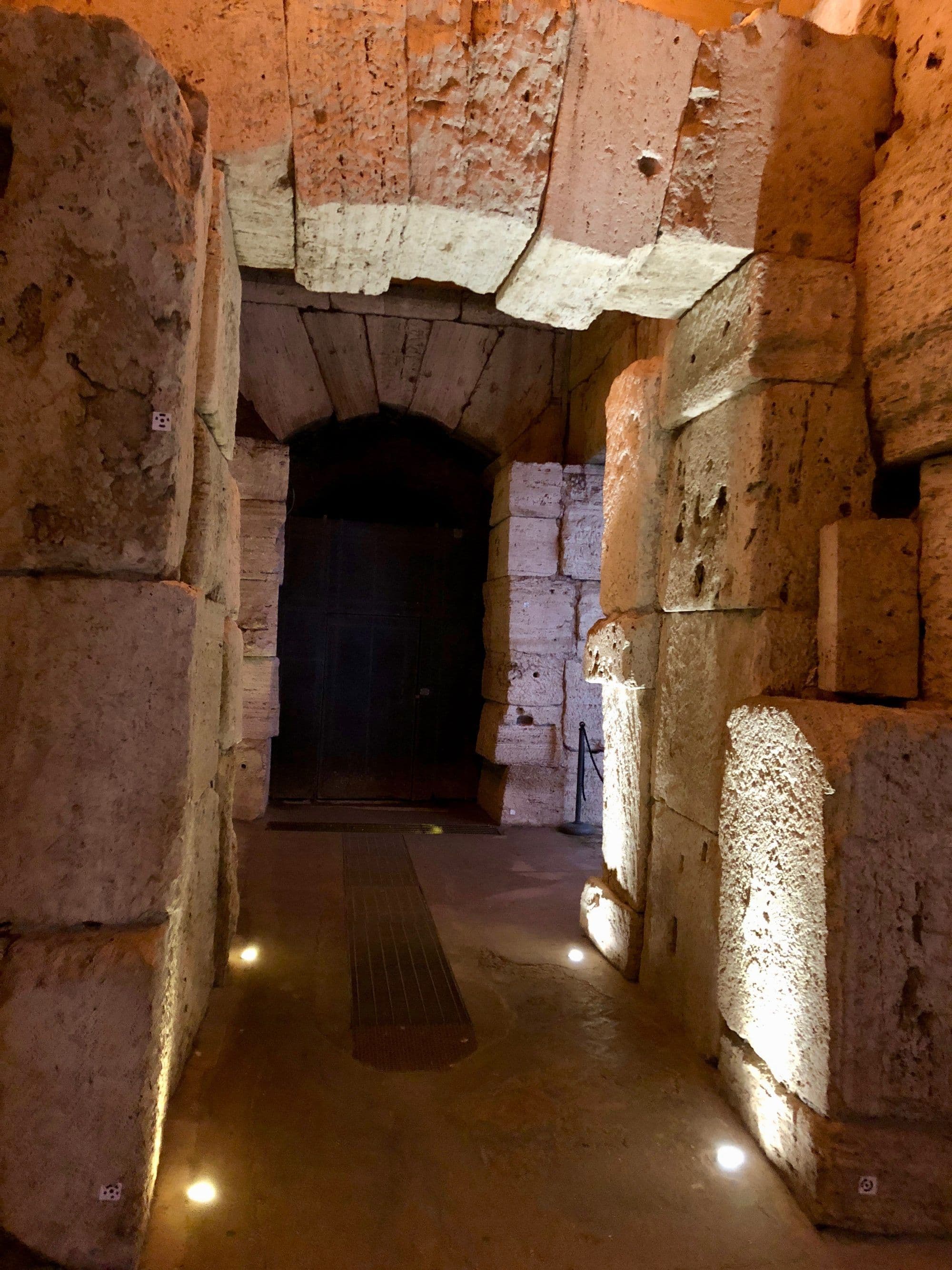 The exposed stone corridors of the Colosseum underground
